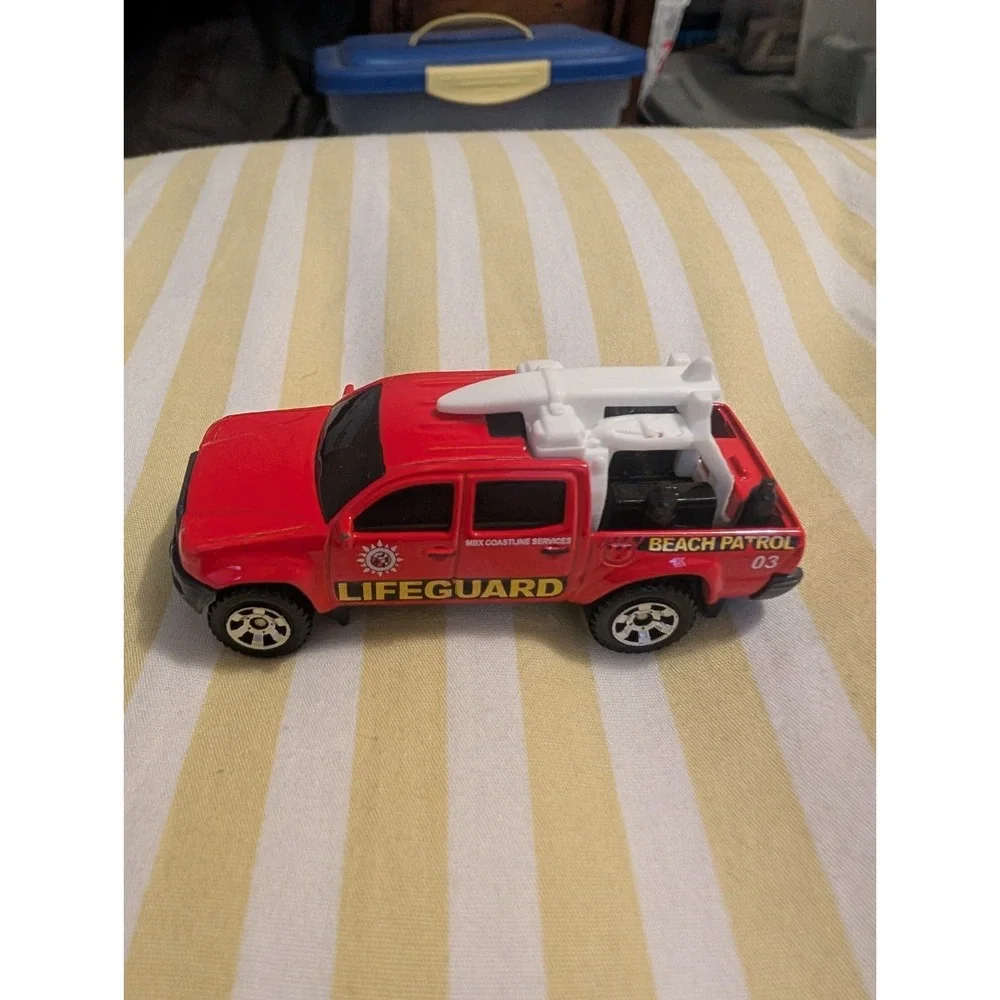 Matchbox 2014 Toyota Tacoma Lifeguard Red Heroic Rescue 1:64 Diecast Truck #105